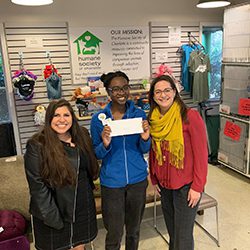Law Offices of James Scott Farrin making a donation to the Humane Society