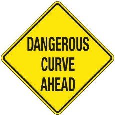 Yellow dangerous curve ahead diamond road sign