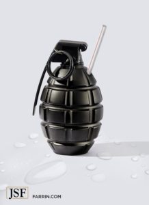 A grenade with a drinking straw and spilled water, symbolizing contaminated water.