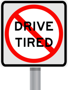 Highway sign that reads DON'T DRIVE TIRED.