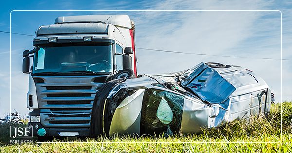 Car wrecked after a truck accident