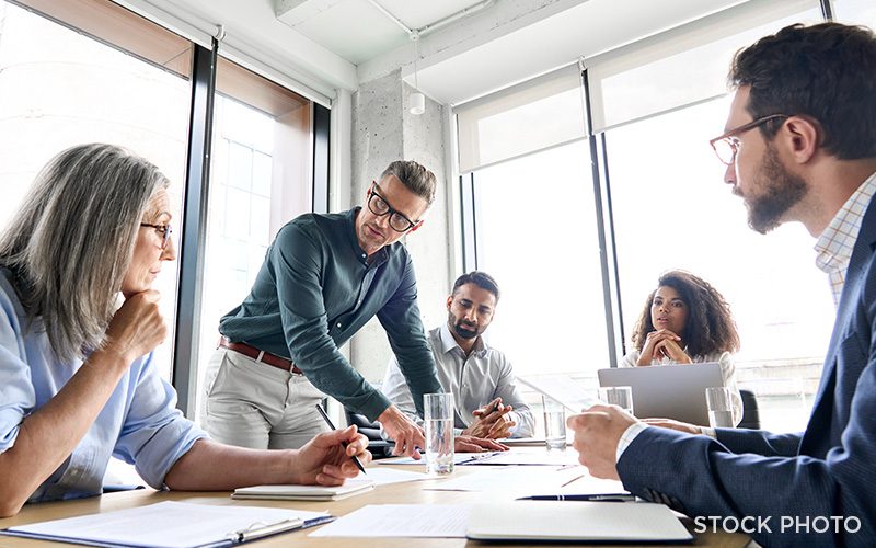 An intense mediation meeting with attorneys and clients.