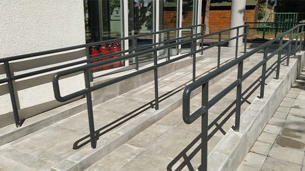 A school building with a wheelchair ramp