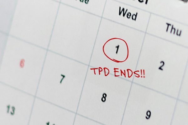 Law Offices of James Scott Farrin North Carolina workers’ compensation attorneys. Calendar highlights circled date marking end of temporary partial disability benefits.